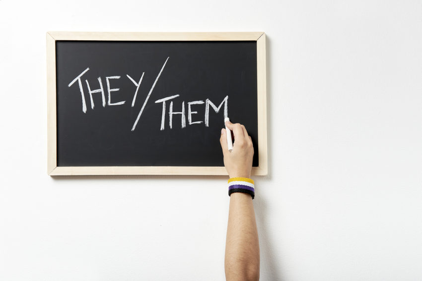 They / Them written on a chalkboard - What is Non-Binary?